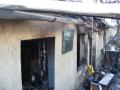 O femeie a murit, după ce casa i-a luat foc (FOTO)