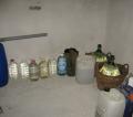 Fabrică clandestină de alcool, descoperită la un patron din Beiuş