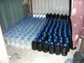 Proprietarii unei fabrici clandestine de alcool, anchetaţi pentru evaziune fiscală de peste 900.000 lei (FOTO)