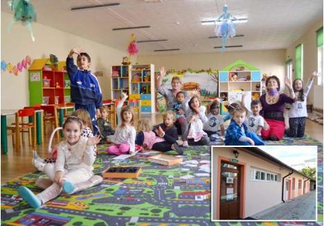 ZÂMBETE LA GRĂDI. Deşi frecventează de puţin timp grădiniţa bisericii din Velenţa, copilaşii se simt în largul lor în sala colorată