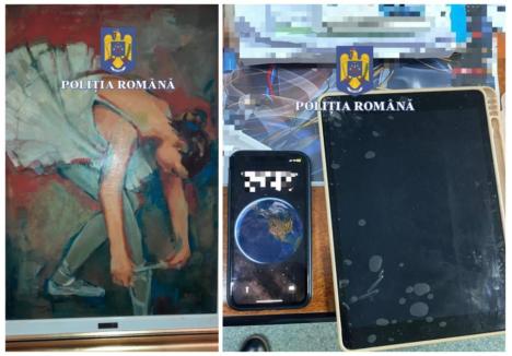 Fotografii transmise de Poliția Română, cu prilejul perchezițiilor. Nu este clar însă ce însemnătate are tabloul suprins de oamenii legii ori la ce foloseau dispozitivele electronice ridicate