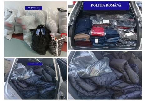 Hainele fake au fost confiscate de poliţişti iar proprietarii mărcilor ale căror însemne au fost falsificate s-au constituit părţi civile. foto: Poliţia Bihor