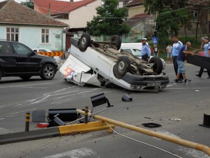 Accident spectaculos cu trei maşini, între care un BMW, în Nufărul (FOTO)