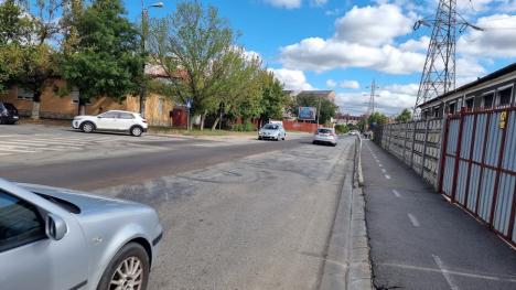 S-au acoperit conductele. Duminică a fost reluat traficul auto pe strada Oneștilor (FOTO)