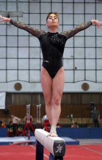 Fostă vice campioană europeană şi mondială la gimnastică, o româncă a ajuns damă de companie! (FOTO)
