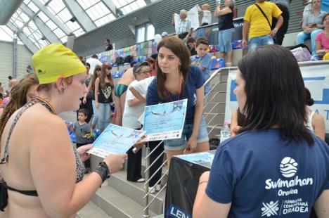 La dublu: Ediţia a doua a Swimathon a adunat de două mai mulţi înotători şi bani (FOTO)