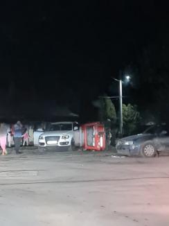 Accident cu trei maşini în Beiuş. Una s-a răsturnat (FOTO / VIDEO)