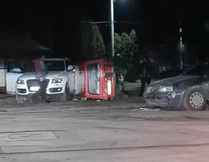 Accident cu trei maşini în Beiuş. Una s-a răsturnat (FOTO / VIDEO)
