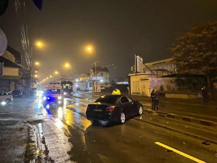 Accident pe Bulevardul Decebal din Oradea, între un BMW și un Audi. Șoferul BMW-ului a fugit (FOTO)