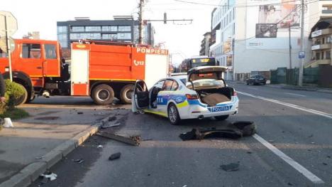 Lovit deja: un BMW nou al Poliţiei Cluj a fost distrus într-un carambol cu patru maşini (FOTO)