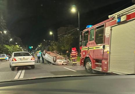 Accident în Oradea, lângă Mc Donald’s Nufărul: Un Audi a ajuns cu roţile în sus  