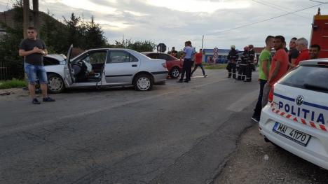 Accident grav în Sîntandrei: Două persoane rănite, după ce un Audi s-a lovit cu un Peugeot (FOTO/VIDEO)