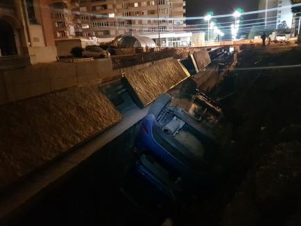 A căzut cu mașina într-o groapă uriașă, din șantierul pasajului subteran Magheru! (FOTO / VIDEO)