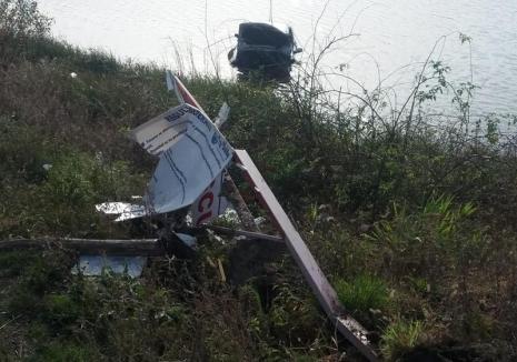 Accident în Paleu. O şoferiţă de 18 ani a plonjat cu maşina în lac! (FOTO)