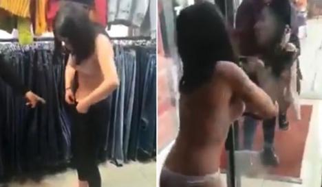 Caz frapant: Adolescentă lovită, dezbrăcată şi scoasă în stradă de vânzătoarea unui magazin, după ce a încercat să fure pantaloni (VIDEO)