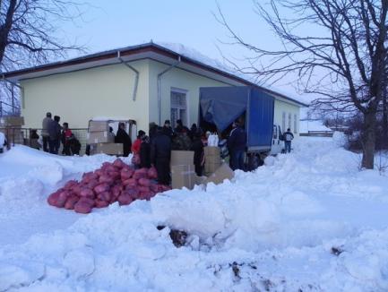 Firmele bihorene au deszăpezit drumul de acces spre satul Stupina (FOTO)