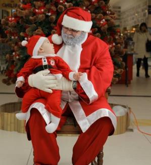 2 în 1: Fă-ţi poză cu Moş Crăciun şi dăruieşti un cadou copiilor orfani!