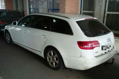 'Aglomeraţie' în Borş. Poliţiştii au prins doi urmăriţi, dintre care unul internaţional, şi au confiscat un Audi A6 furat din Polonia