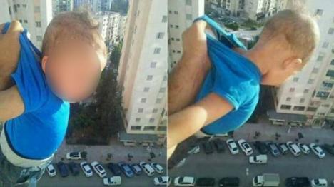 Facebook i-a luat minţile: A ținut un copil atârnat pe geam, la etajul al 15-lea, pentru a primi like-uri