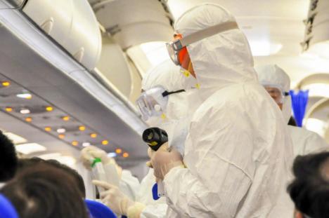 Nesimţire: Infectat cu coronavirus, un român din Spania a urcat în avion şi a venit în România
