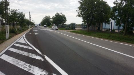 Pentru a elimina ambuteiajele, Primăria a lărgit o porţiune a şoselei dintre Oradea şi Sântandrei (FOTO)
