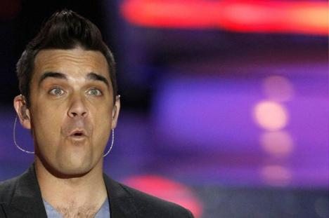 Gafă uriaşă a lui Robbie Williams: A confundat Serbia cu România