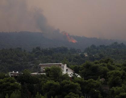 Acte criminale? Autorităţile din Grecia spun că au 'indicii serioase' că incendiile dezastruoase au fost provocate (FOTO)