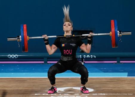 Ea este tânăra de 21 de ani care a adus României prima medalie olimpică din istorie la haltere feminin (FOTO/VIDEO)