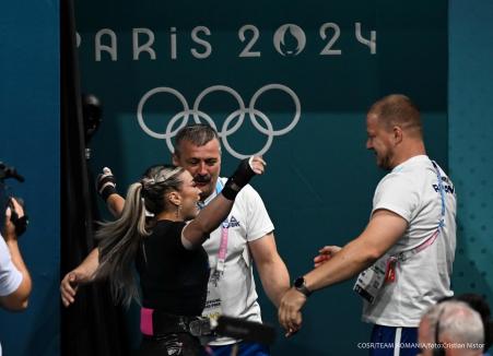 Ea este tânăra de 21 de ani care a adus României prima medalie olimpică din istorie la haltere feminin (FOTO/VIDEO)