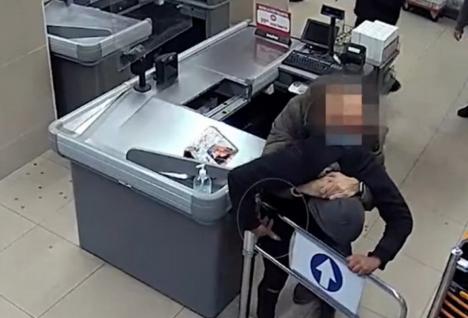 Cum a oprit un poliţist aflat în timpul liber un jaf armat într-un supermarket (VIDEO)
