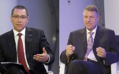 Klaus Iohannis şi Victor Ponta se războiesc online