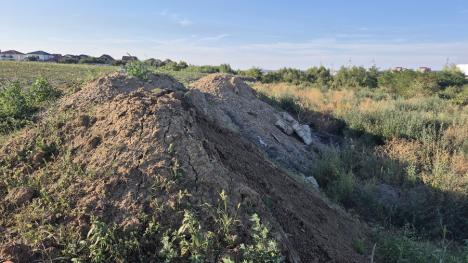 Au furat lacul! Sub nasul autorităților, un lac menit să protejeze Oradea de inundații a fost acoperit cu moloz (FOTO)