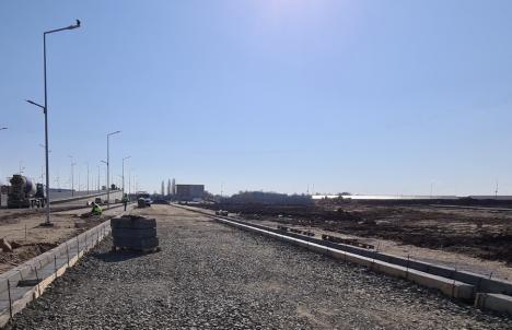 Pe terminate. Drumul colector dintre Leroy Merlin și Piața 100 urmează să fie asfaltat (FOTO / VIDEO)