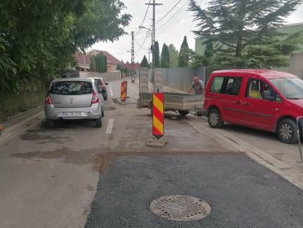 Milionari în penalități: Constructorul Asfamixt mai mult păgubește fiindcă a reabilitat prost strada Piersicilor (FOTO)