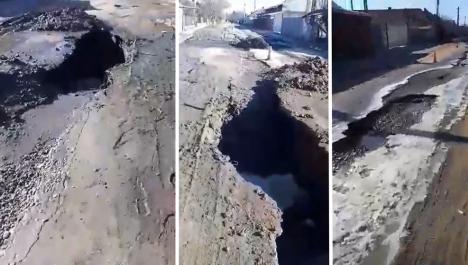 Groapă uriaşă în Valea lui Mihai. O stradă s-a surpat parţial după o lucrare la reţeaua de canalizare (VIDEO)