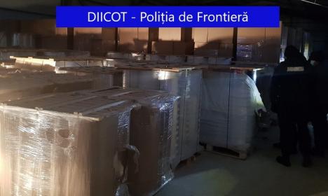 Percheziţii DIICOT în Bihor şi în alte judeţe ale ţării: 50 persoane ridicate în dosarul unei grupări care şi-a făcut fabrică clandestină de ţigări (FOTO / VIDEO)