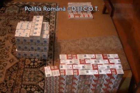 Percheziţii la o reţea de contrabandişti de ţigări. Patru persoane au fost reţinute (FOTO/VIDEO)