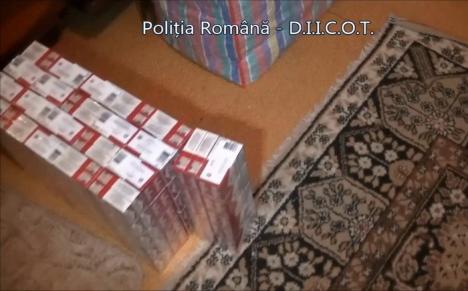 Percheziţii la o reţea de contrabandişti de ţigări. Patru persoane au fost reţinute (FOTO/VIDEO)