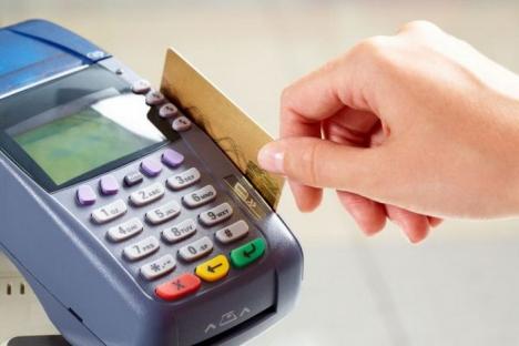 Din 16 septembrie, persoanele fizice pot plăti impozite, taxe şi amenzi cu cardul la Trezorerie