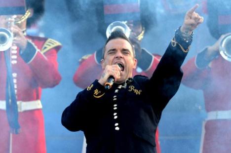 Robbie Williams ar putea concerta în România