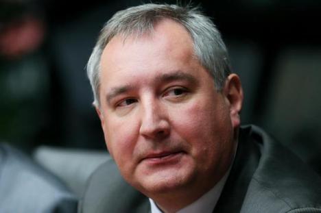 Război româno-rus în declaraţii: Vicepremierul Dmitri Rogozin vrea să zboare cu bombardierul deasupra României, Băsescu îi spune că e beat
