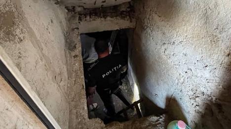 Descoperire șocantă! Un schelet uman a fost găsit în subsolul unui bloc din Aleşd, într-o boxă ce nu fusese deschisă de 10 ani 
