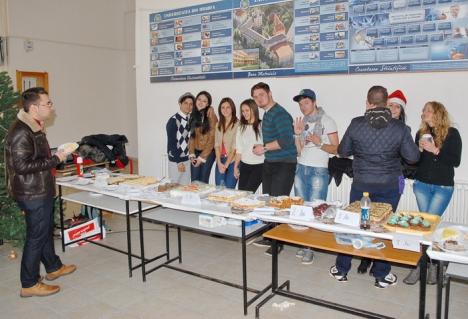 Caritate dulce: Studenţii ASUO au vândut prăjituri pentru copiii din grija statului