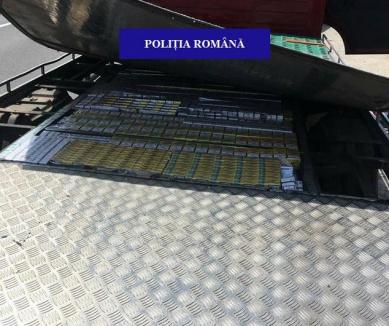 Şofer de camion, prins cu 8.000 de pachete de ţigări de contrabandă lângă Uileacu de Criş: Poliţiştii i-au întocmit dosar penal (FOTO)