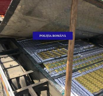 Şofer de camion, prins cu 8.000 de pachete de ţigări de contrabandă lângă Uileacu de Criş: Poliţiştii i-au întocmit dosar penal (FOTO)