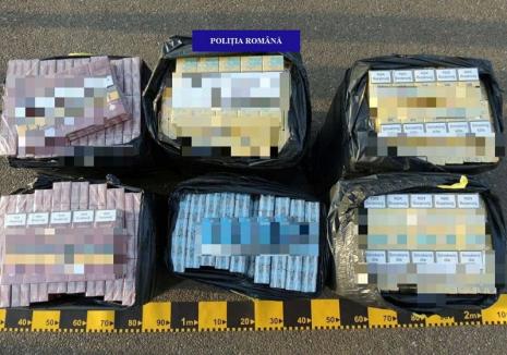 Captură de ţigări de contrabandă în centrul Oradiei: Un individ transporta 3.000 de pachete în maşină (FOTO)