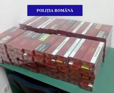 Doi tineri din Bihor au dosar penal după ce au fost prinşi în trafic cu 1.000 de pachete de ţigări de contrabandă