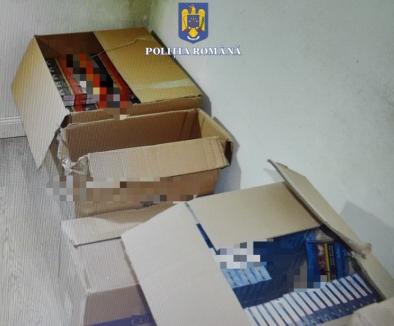 Peste 7.500 de pachete de ţigări de contrabandă descoperite într-o cameră secretă în Nojorid. Proprietarul casei a fost reţinut (FOTO)