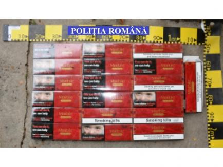 Fostul director al Colegiului Unirea Ştei, Voicu Burtă, percheziţionat în dosarul contrabandiştilor cu ţigări (FOTO)