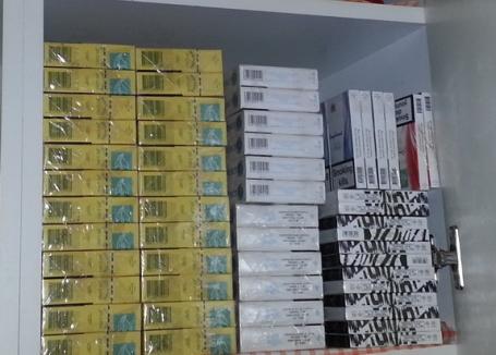 Poliţiştii cer trimiterea în judecată a 26 de persoane din gruparea ce alimenta Piaţa Mare cu ţigări de contrabandă